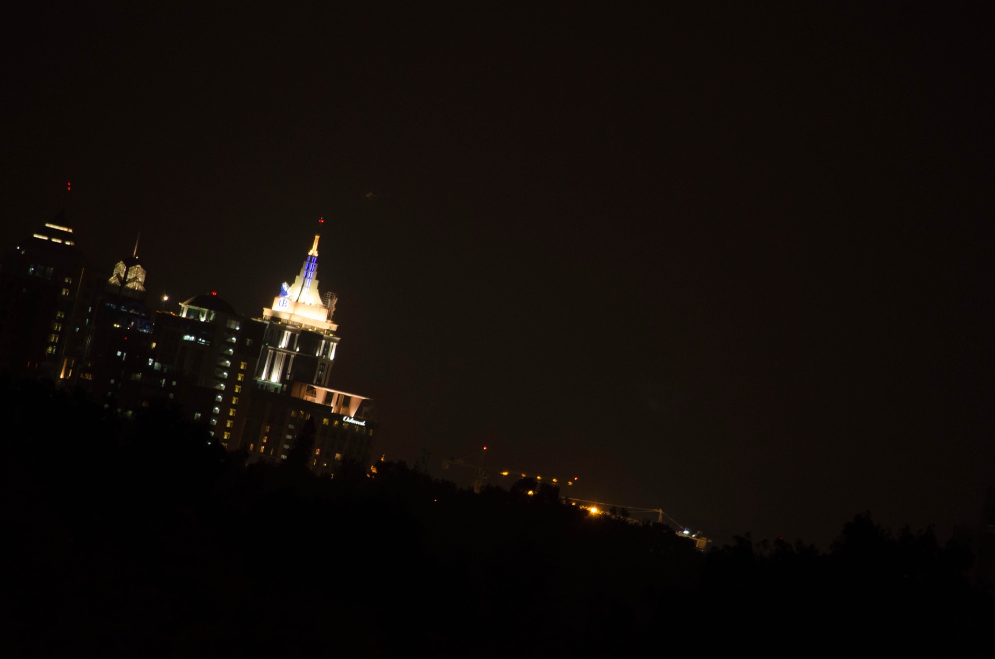 Night skyline of Bengaluru with UB City tower illuminated