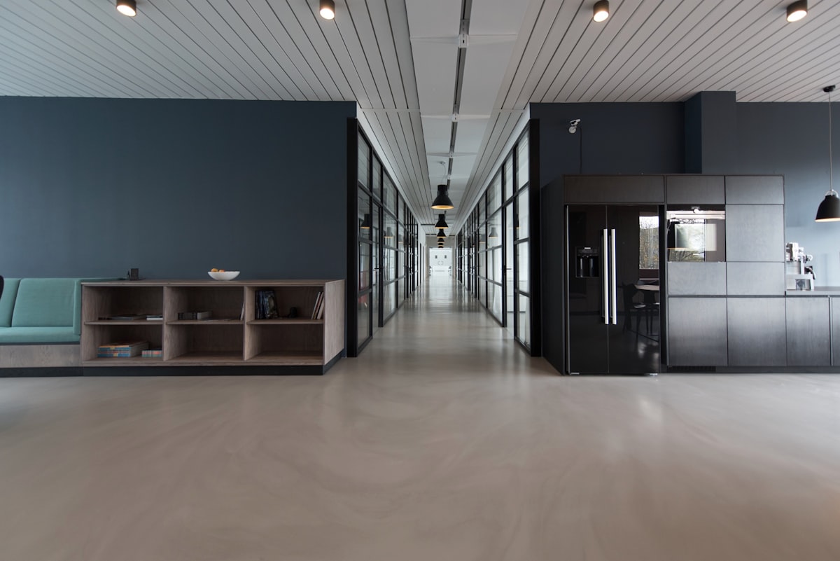 Bright modern office workspace with desks and natural light